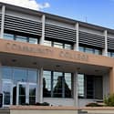 community college budget surplus photo