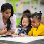 teacher and schoolchildren lessons