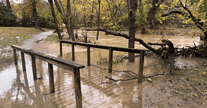 Creek flooded outside Dallas extreme weather legislative agenda op-ed