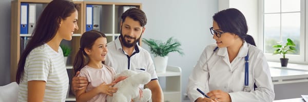 happy family at doctors office