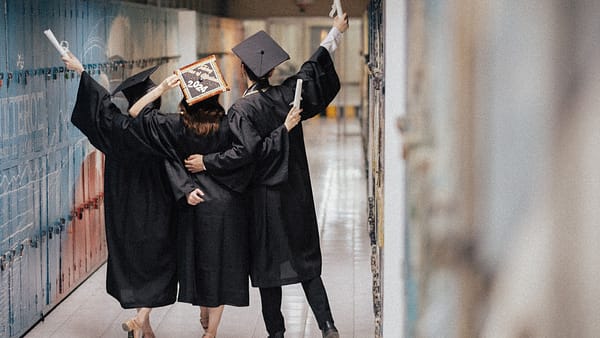 grads celebrating