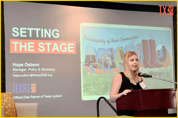 Texas 2036 Manager of Policy and Advocacy Hope Osborn presents at a podim in front of a screen. 