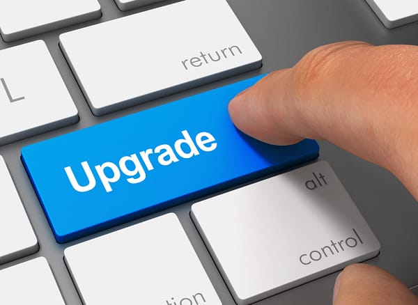 Pushing an upgrade button on a keyboard