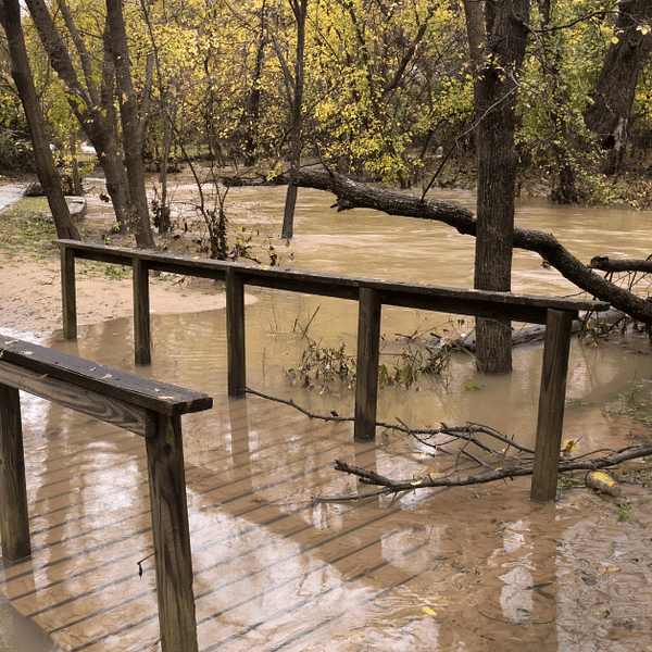 Creek flooded outside Dallas extreme weather legislative agenda op-ed