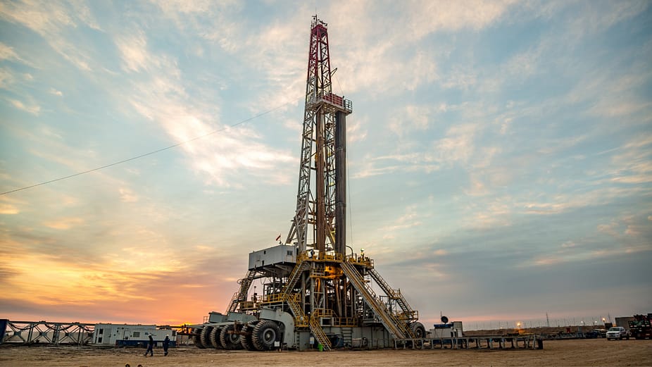 oil drilling rig at dawn