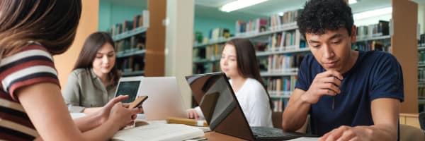 students in library